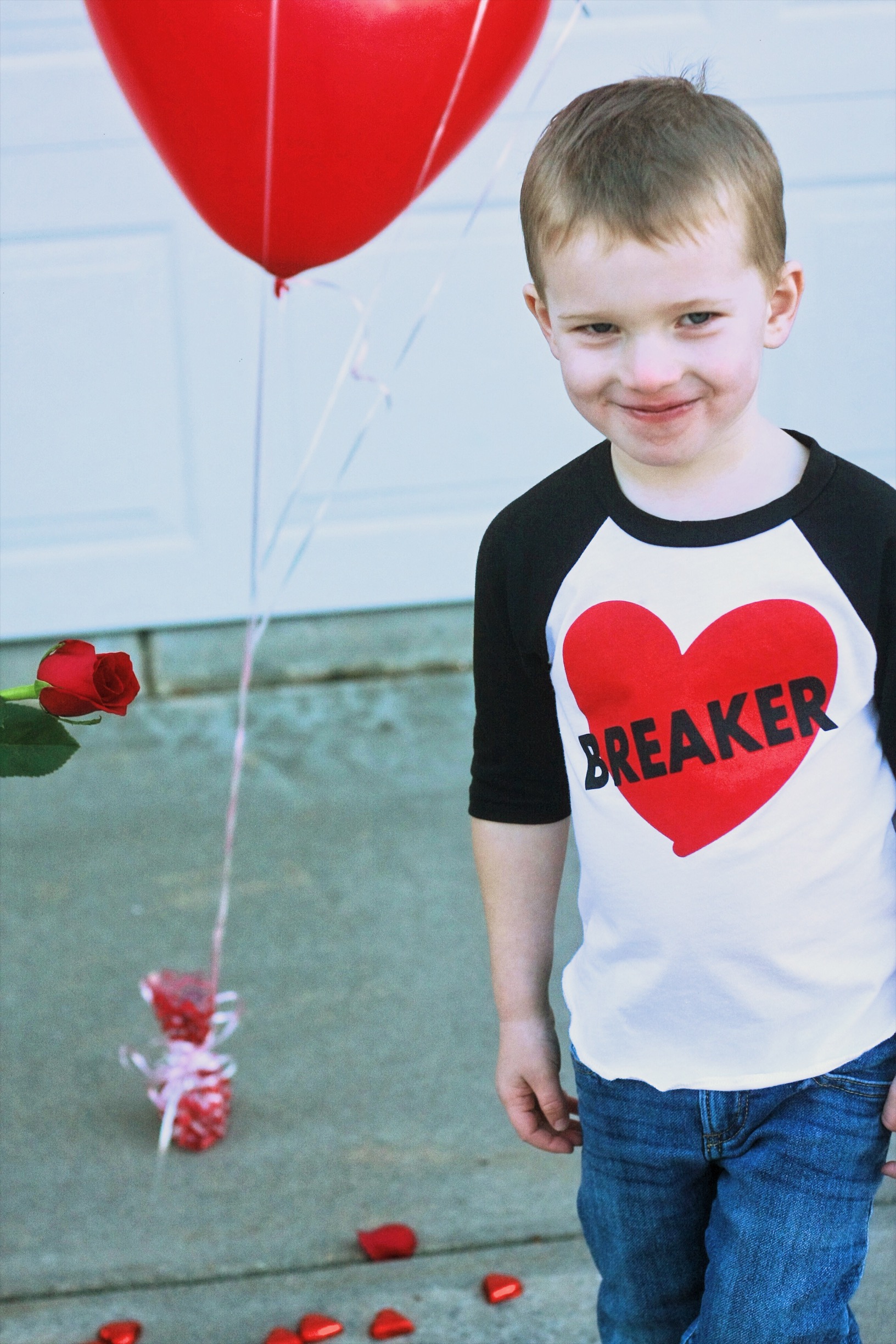 Nebraska Motherhood + Fashion blogger, Leslie of Tiny Stampede shares Boy's Valentine's Tees & Accessories. Dress your handsome little Valentine up with adorable Tees and Bow Ties from Etsy | Boys Valentine's tees & accessories |